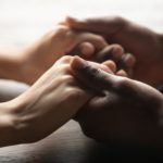 couple holding hands