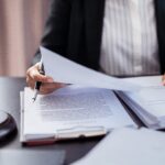 Solicitor preparing legal documents.