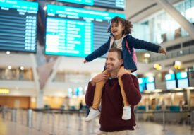 Father and daughter at the airport